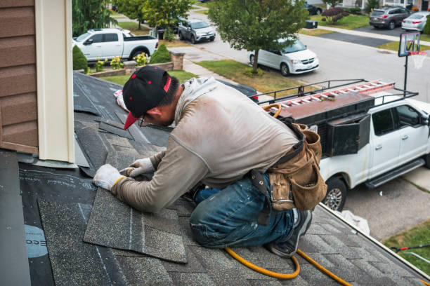 Professional Storm Damage Roof Repair technician working in Bozman, MD